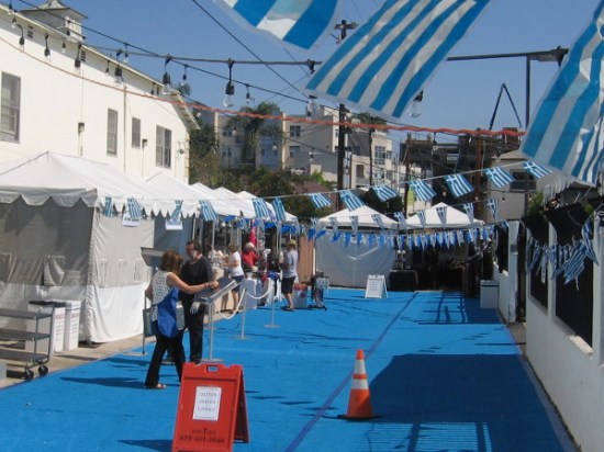 An hour before the event opens, preparations are being made for coming crowds.