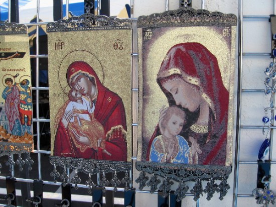 Icons of Mary and infant Jesus appear as if they're gilded in the San Diego morning sunshine.