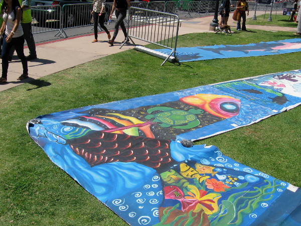 Visitors to Balboa Park in San Diego walk past an unexpected cool sight!