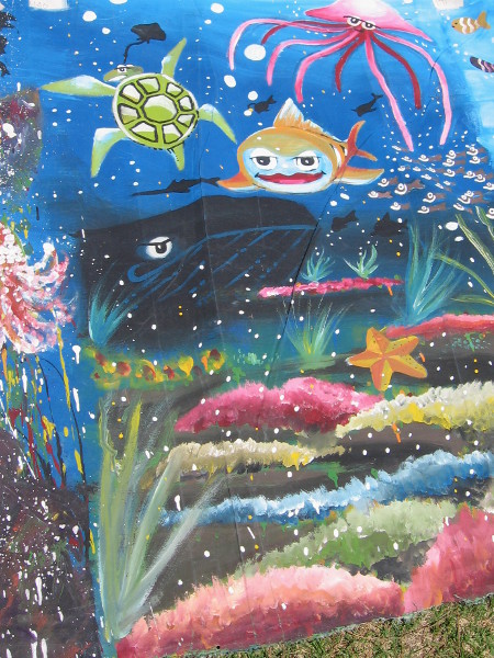 I see a turtle, whale, starfish and octopus.