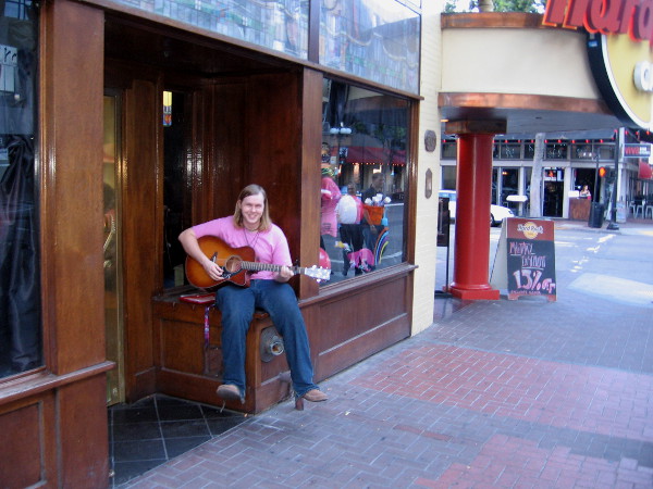 While I walked around, I spotted this cool guitarist making music by the door of the Hard Rock Cafe.