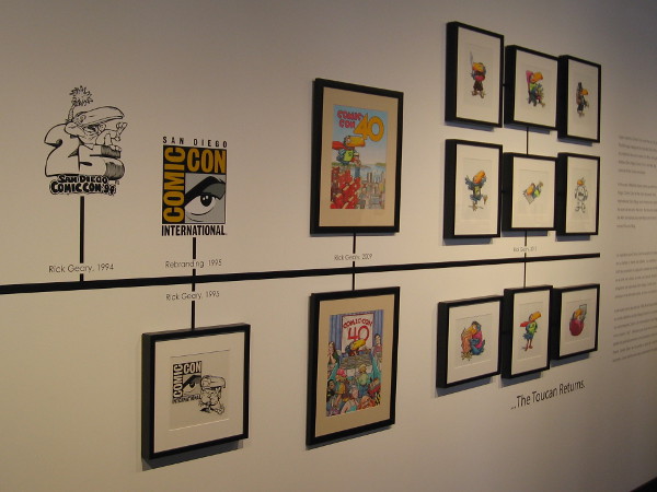 This part of the exhibit traces the history of the Comic-Con International logo and the development of the popular toucan mascot.