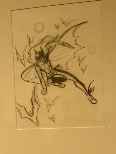A penciled panel featuring Batgirl in action. Part of a cool display which demonstrates the processes involved in creating a comic book.