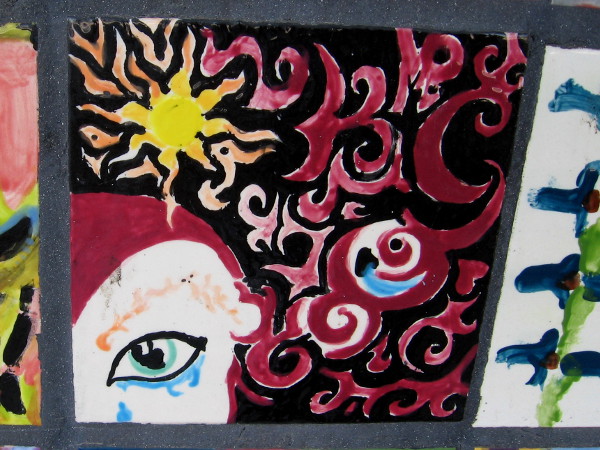 Another eye on a fiery, dazzling art tile.