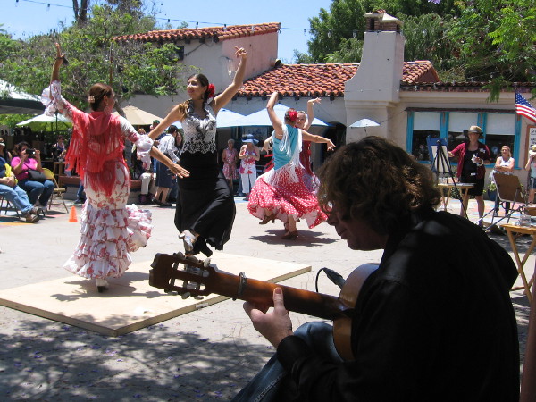 Guitar music propels Flamenco dancers in Balboa Park's Spanish Village.