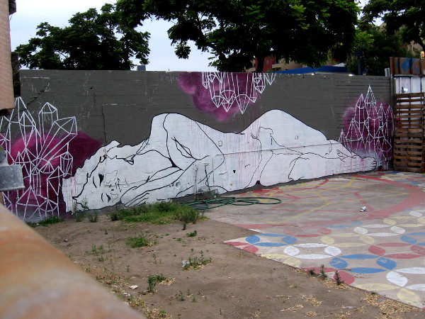 Napping white female outline and some geometric crystals.