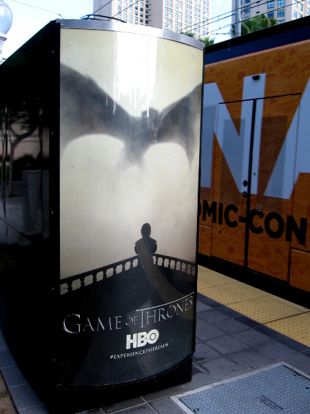 Game of Thrones advertisement at a trolley station. A Conan Live at Comic-Con trolley wrap passes by.