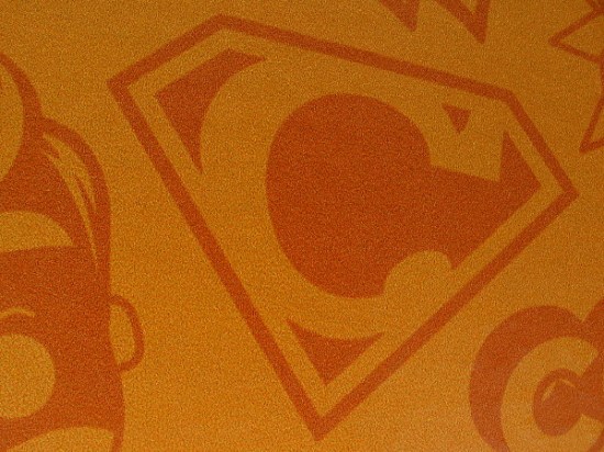 Or perhaps Conan O'Brien will wear a Superman-style emblem that warns all villains of his heightened powers, which include flaming hair.