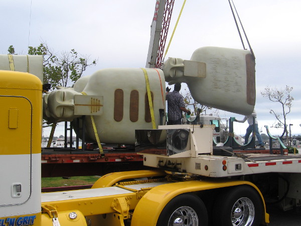 Bronze sculptures of Our Silences, by Mexican artist Rivelino, are loaded onto a truck for transport from San Diego to San Francisco. Each figure weighs about a ton.