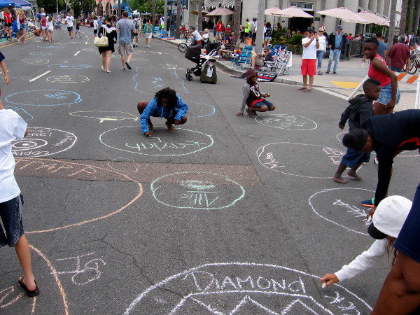 Finishing touches are put on the poop circles. Should a horse poop in your chalk circle, you win a special prize!