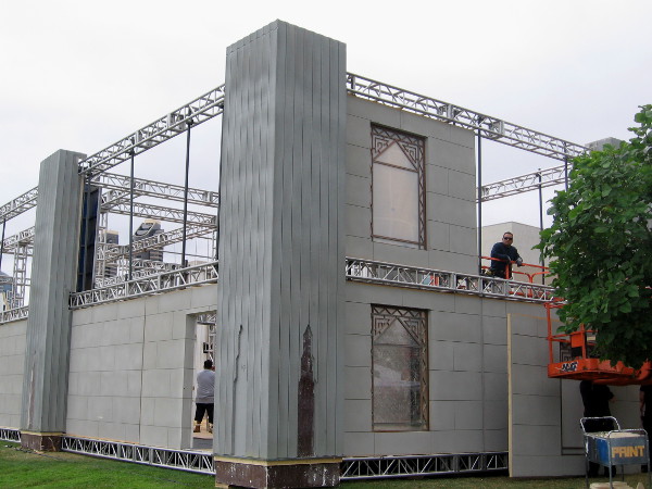 A second, larger building is also rising, across the grass of Hilton Bayfront Park.