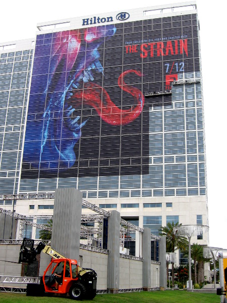 The Strain building wrap on the Hilton is nearing completion, two days before Comic-Con begins.
