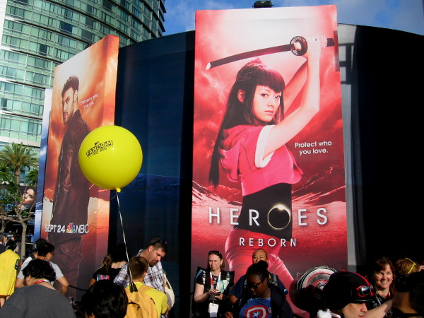 Heroes Reborn venue had huge images of the powerful characters around the black structure.