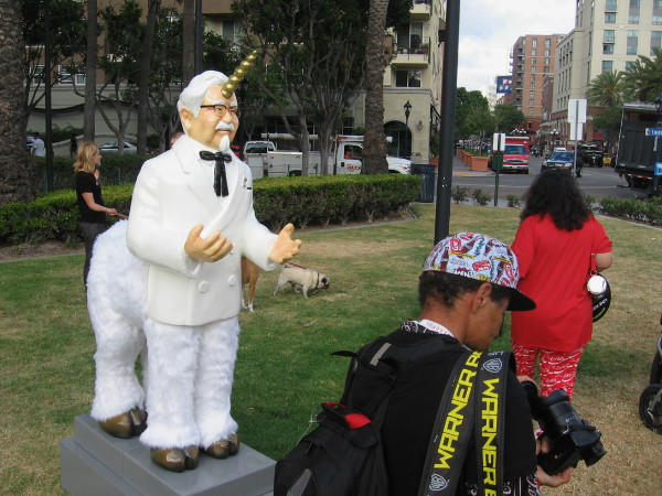 The downright silly new Colonel Sanders is shown as a unicorn standing by Martin Luther King Jr. Promenade.