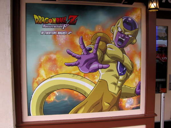 A cool Dragon Ball Z poster in window of a Gaslamp eatery.