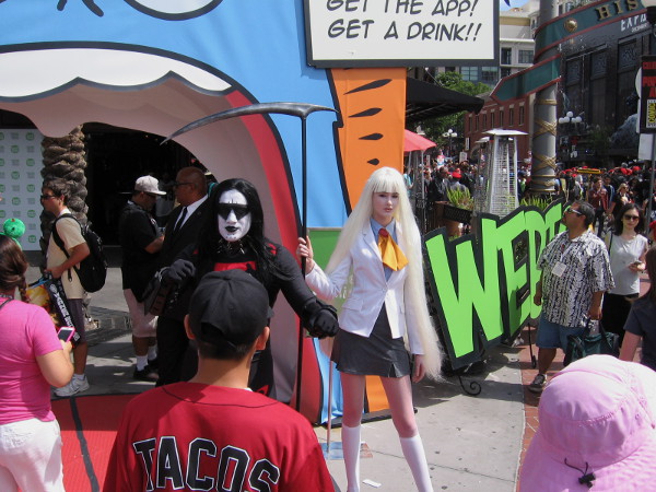 I believe the face-painted cosplay that looks kind of like the rock band Kiss is a character from Korean comics.