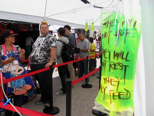These brave people lined up near Petco Park's scary The Walking Dead Escape will experience zombies in virtual reality!