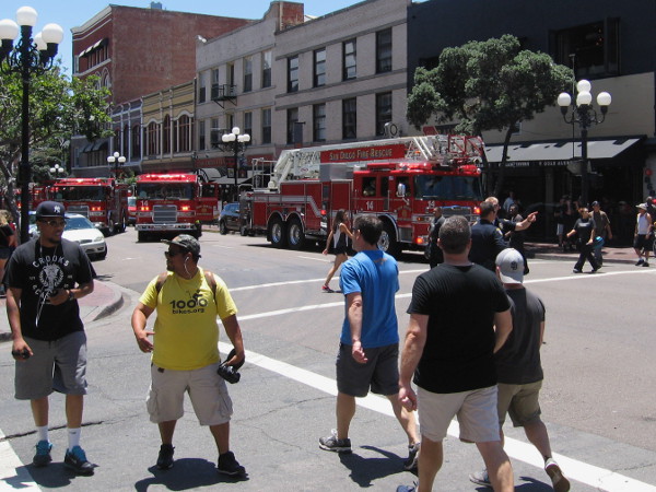 But wait! All the fabricated hype and escapist fantasy is rudely interrupted by real sirens and flashing lights!