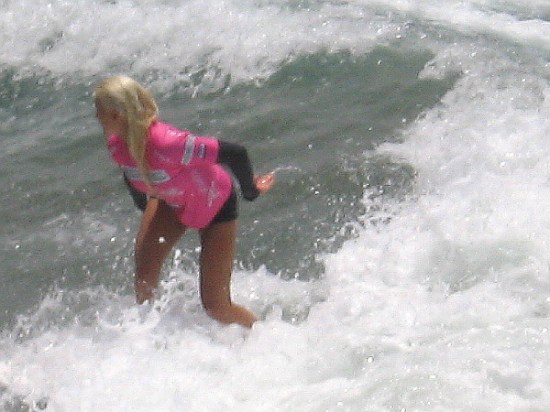 Tatiana Weston-Webb, professional WSF surfer from the island of Kaua'i, competes at 2015 Supergirl Pro event in Oceanside, California. She eventually went on to win the final!