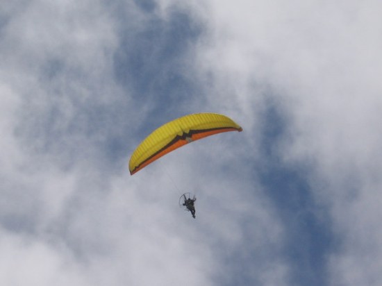 Now this person had the best view of all. A paraglider soars quietly above!