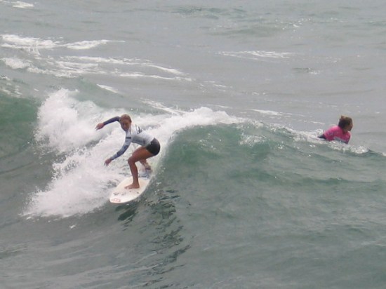 Two competitors duel, trying their best to advance in the 2015 Supergirl Pro in Oceanside, California.