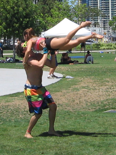 Two graceful acrobats seem to engage in a dance!