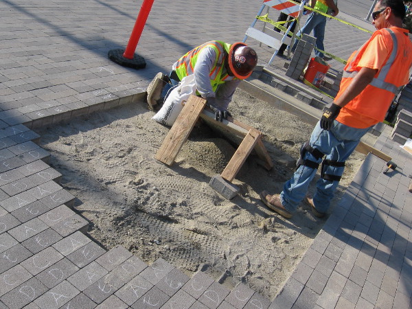 Workers have begun to install the first paver bricks dedicated to people, businesses or organizations at the foot of San Diego's Broadway Pier.