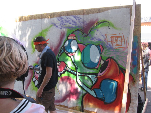 Artist creates live street art during 2015 CityFest in Hillcrest.