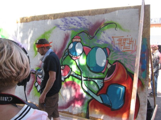 Artist creates live street art during 2015 CityFest in Hillcrest.