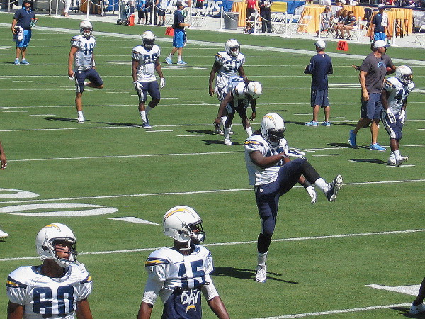Here comes a line of Chargers stepping high during the warm up routine.