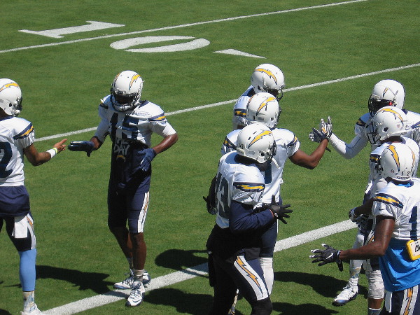 After a good workout, players offer some mutual congrats and encouragement.