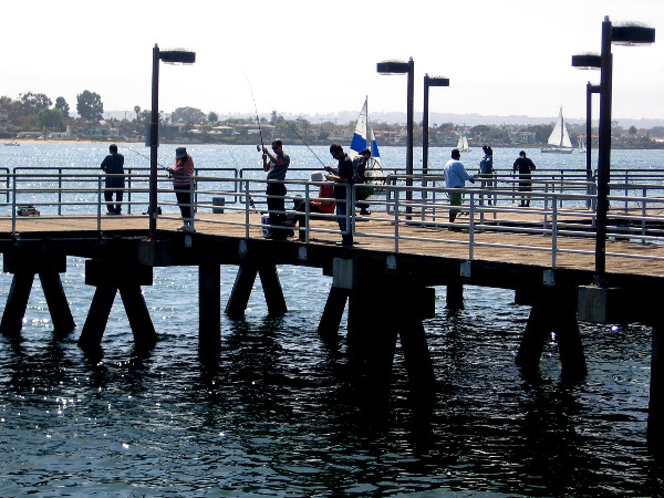 The small pier is a favorite spot for fishermen and families, especially on weekends and during the summer.