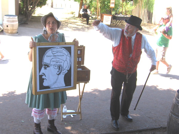 These two snake oil salespeople were selling Ether of Muse. One whiff of the potent elixir and writing literature is a snap.