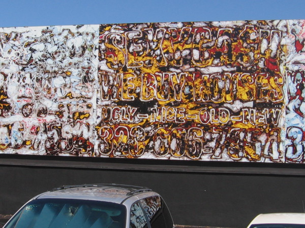 This eye-boggling street mural on Fay Avenue is Sexy Cash, 2015, by Mark Bradford.