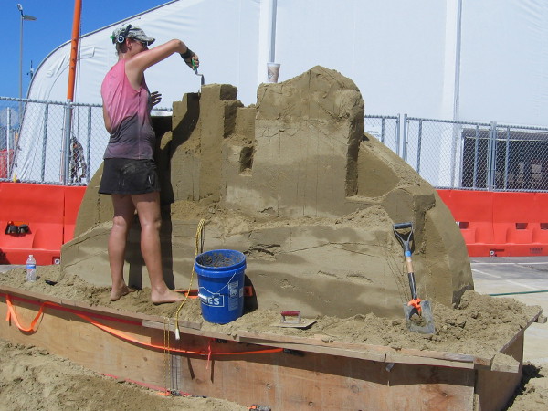 Susanne is carefully working on another cool sand sculpture for event visitors. I can't wait to see what she produces during the competition!