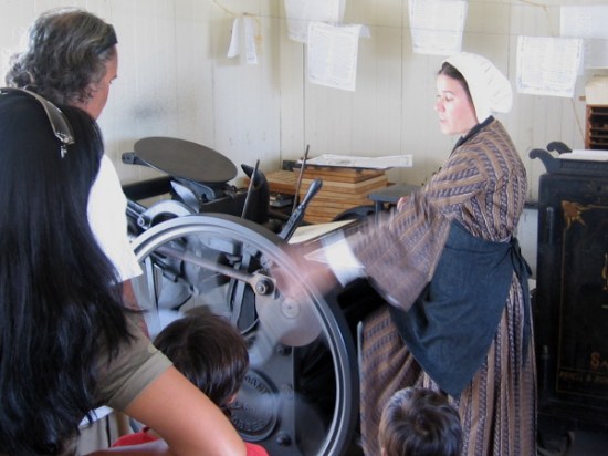 Printing press demonstration underway at the San Diego Union Museum print shop in Old Town.