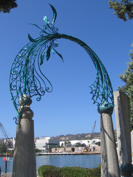 A soaring sculptural arch made of beautiful ironwork.