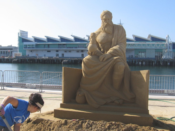 Zeus seems to be sitting at the edge of the B Street Pier in downtown San Diego! The Port Pavilion and the Broadway Pier are in the background.