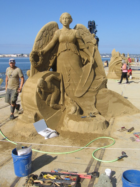 Ilya Filimontsev's sculpture is titled Never Give Up!!! Wow! Now that's an impressive sand sculpture. And he wasn't finished!