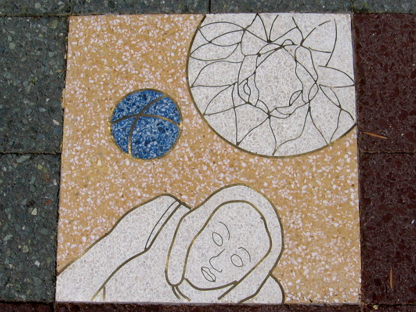 This fun artwork causes the curious viewer to actively walk around the large Activity Center patio. Now that's true kinetic art!