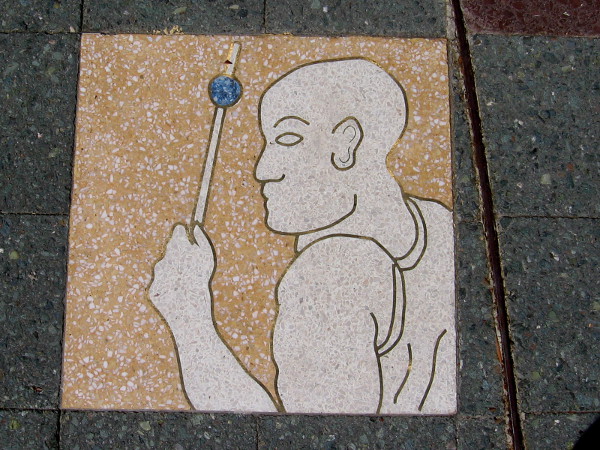 A blue circle on a stick. What sport is this?