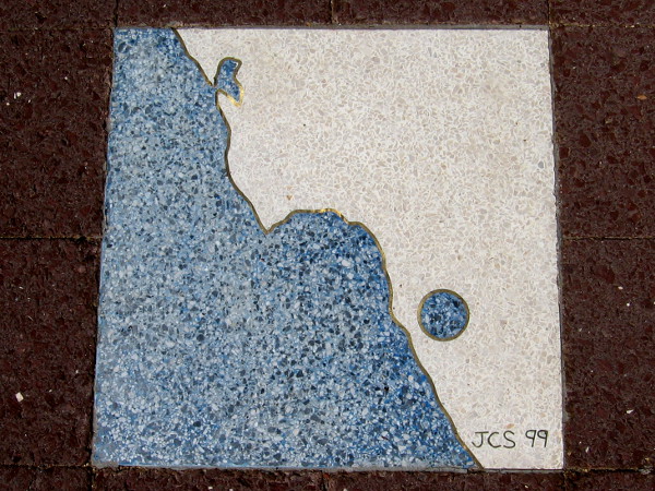 The blue circle now seems to be a lake inside the contours of an ocean coast.