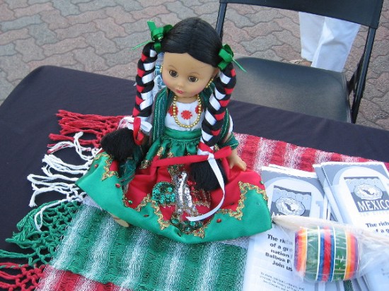 Doll greets visitors at Friday evening House of Mexico event in Balboa Park.