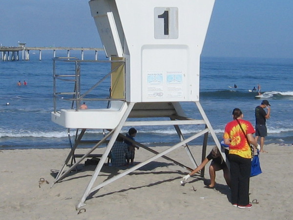 Someone found a piece of trash under lifeguard tower number one!