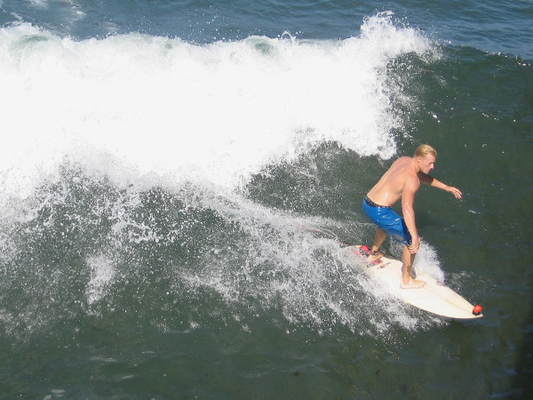 This surf dude caught himself a sweet liquid ride!