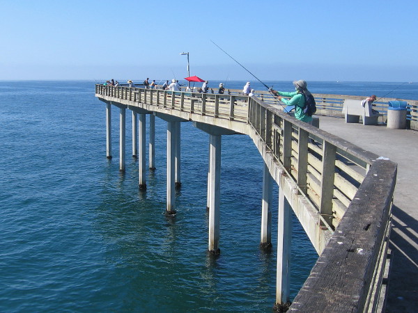 These fishermen at the t-shaped end of the pier are trying to catch bass, bonito, mackerel, or just about anything that bites!