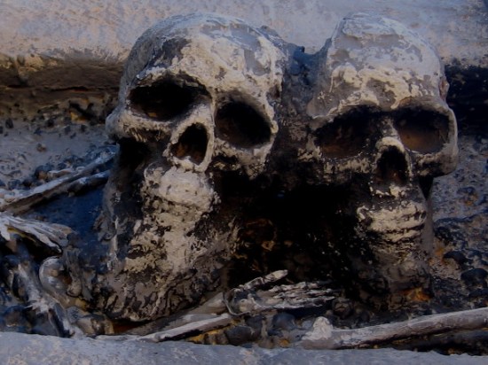 Creepy skulls await visitors near entrance to The Haunted Trail for the approaching Halloween season.
