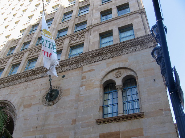 Flag on stately exterior of Courtyard by Marriott San Diego Downtown.