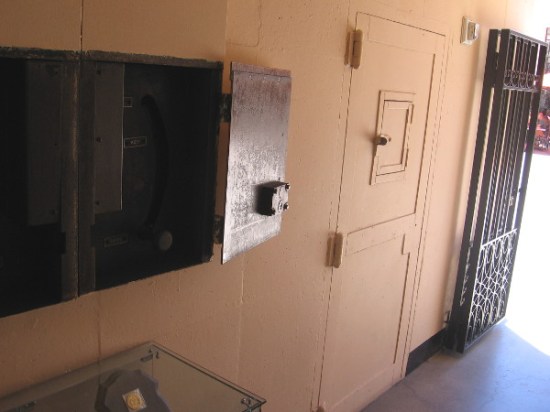 The door of a holding cell in the old police headquarters corridor.