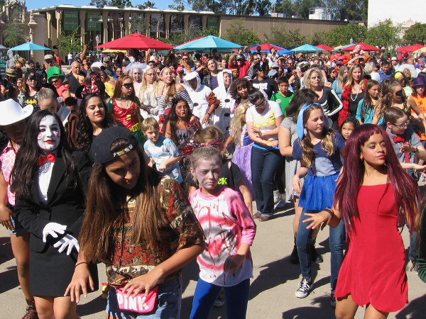 Zombies and ghouls gather for a scare at Balboa Park Halloween Family Day.